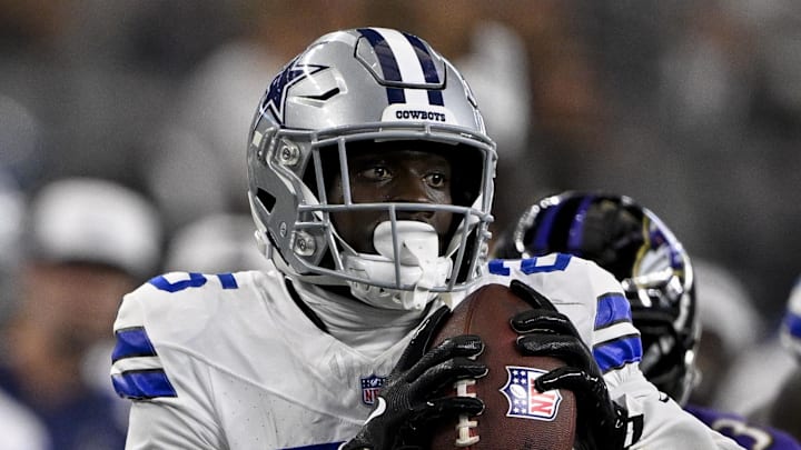Former Dallas Cowboys cornerback Andrew Booth (25) returns an interception for touchdown against the Baltimore Ravens