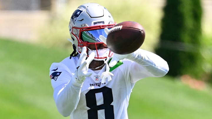 Jul 23, 2025; Foxborough, MA, USA; New England Patriots wide receiver Stefon Diggs (8) makes a catch during training camp at Gillette Stadium. Mandatory Credit: Eric Canha-Imagn Images