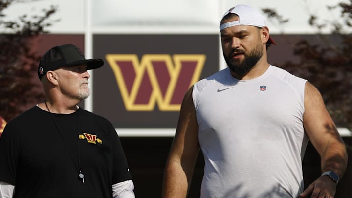 Washington Commanders head coach Dan Quinn and right guard Sam Cosmi 