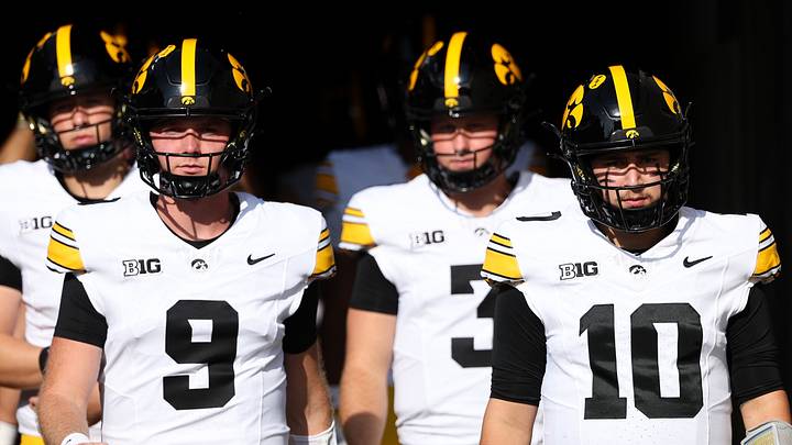 Oct 24, 2026; Minneapolis, Minnesota, USA; Iowa Hawkeyes quarterback Jeremy Hecklinski (10) and Iowa Hawkeyes quarterback Hank Brown (9) take the field before the game against the Minnesota Golden Gophers at Huntington Bank Stadium. Mandatory Credit: Matt Krohn-Imagn Images Oct 24, 2026; Minneapolis, Minnesota, USA; Iowa Hawkeyes quarterback Jeremy Hecklinski (10) and Iowa Hawkeyes quarterback Hank Brown (9) take the field before the game against the Minnesota Golden Gophers at Huntington Bank Stadium. Mandatory Credit: Matt Krohn-Imagn Images