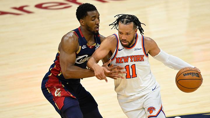 May 23, 2026; Cleveland, Ohio, USA; New York Knicks guard Jalen Brunson (11) moves the ball against Cleveland Cavaliers guard Donovan Mitchell (45)  the ball in the fourth quarter during game three of the eastern conference finals for the 2026 NBA playoffs at Rocket Arena. Mandatory Credit: David Richard-Imagn Images