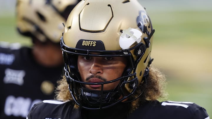Aug 29, 2025; Boulder, Colorado, USA; Colorado Buffaloes quarterback Julian Lewis (10) warms up in the second quarter against the Georgia Tech Yellow Jackets at Folsom Field. Mandatory Credit: Ron Chenoy-Imagn Images