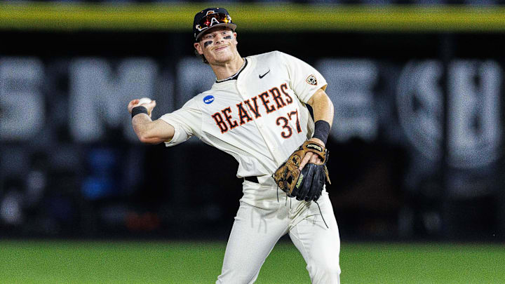 Jun 9, 2024; Lexington, KY, USA; Oregon State Beavers infielder Travis Bazzana (37) throws the ball during the second inning against the Kentucky Wildcats at Kentucky Proud Park. Mandatory Credit: Jordan Prather-Imagn Images