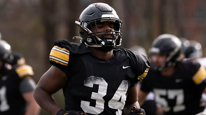 Iowa Hawkeye’s Jay Higgins runs during the team’s practice at Ensworth School in Nashville, Tenn., Friday, Dec. 27, 2024. Iowa Hawkeye’s Jay Higgins runs during the team’s practice at Ensworth School in Nashville, Tenn., Friday, Dec. 27, 2024.