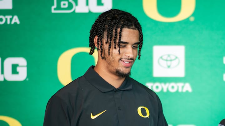 dante moore name image and likeness NIL oregon ducks big ten football dan lanning beats by dre deal evan stewart isaiah world