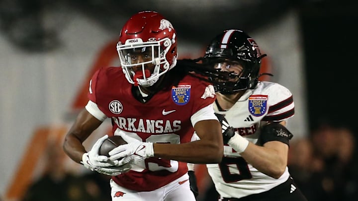 Arkansas Razorbacks wide receiver Dazmin James (83) runs after a catch during the second quarter against the Texas Tech Red Raiders at Simmons Bank Liberty Stadium. 