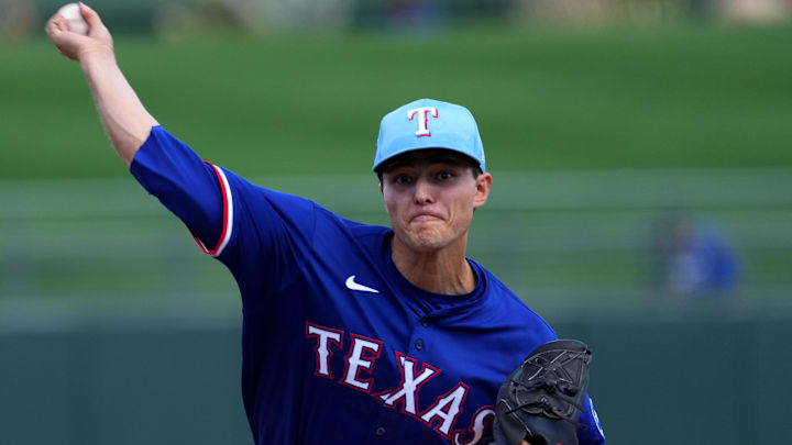 Mar 8, 2024; Surprise, Arizona, USA; Texas Rangers starting pitcher Jack Leiter (71) pitches against the Kansas City Royals during the first inning at Surprise Stadium. 