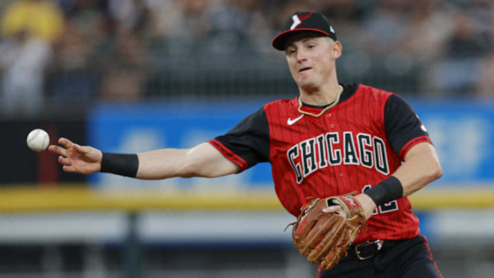 Chicago White Sox shortstop Colson Montgomery (12) throws to first base at Rate Field.