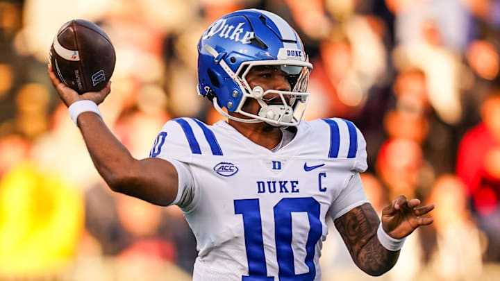 Nov 8, 2025; East Hartford, Connecticut, USA; Duke Blue Devils quarterback Darian Mensah (10) throws a pass against the UConn Huskies in the first quarter at Pratt & Whitney Stadium at Rentschler Field. Mandatory Credit: David Butler II-Imagn Images