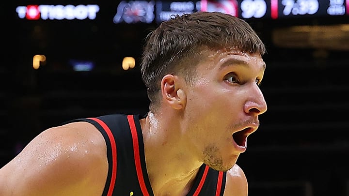 Bogdan Bogdanovic #13 of the Atlanta Hawks reacts against the Cleveland Cavaliers.