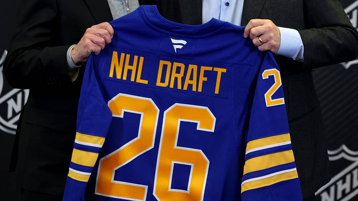 Jan 12, 2026; Buffalo, New York, USA;  NHL Commissioner Gary Bettman and Buffalo Sabres owner Terry Pegula pose for a photo during a press conference announcing the 2026 NHL Draft taking place in Buffalo at KeyBank Center. Mandatory Credit: Timothy T. Ludwig-Imagn Images