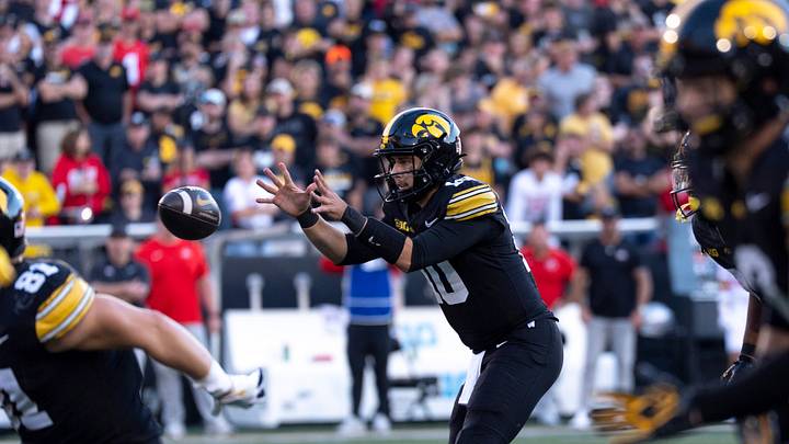Iowa Hawkeyes quarterback Jeremy Hecklinski (10) receives the snap during a Big Ten college football game against the Ohio State Buckeyes Oct. 3, 2026 at Kinnick Stadium in Iowa City, Iowa. Iowa Hawkeyes quarterback Jeremy Hecklinski (10) receives the snap during a Big Ten college football game against the Ohio State Buckeyes Oct. 3, 2026 at Kinnick Stadium in Iowa City, Iowa.
