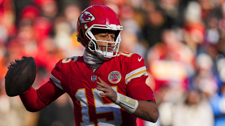 Dec 14, 2025; Kansas City, Missouri, USA; Kansas City Chiefs quarterback Patrick Mahomes (15) looks to pass against the Los Angeles Chargers during the second quarter at GEHA Field at Arrowhead Stadium. Mandatory Credit: Jay Biggerstaff-Imagn Images
