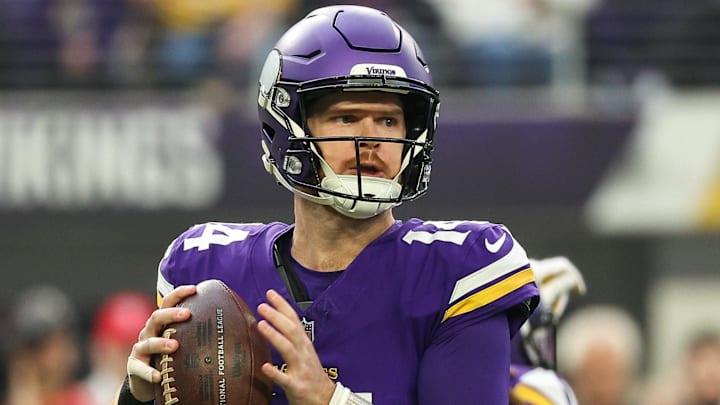 Dec 8, 2024; Minneapolis, Minnesota, USA; Minnesota Vikings quarterback Sam Darnold (14) throws the ball against the Atlanta Falcons during the first quarter at U.S. Bank Stadium. Mandatory Credit: Matt Krohn-Imagn Images
