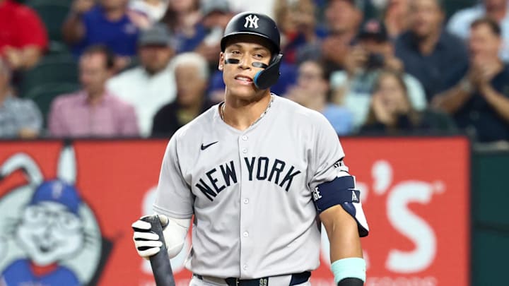 Aug 5, 2025; Arlington, Texas, USA;  New York Yankees designated hitter Aaron Judge (99) reacts after striking out during the first inning against the Texas Rangers at Globe Life Field. Mandatory Credit: Kevin Jairaj-Imagn Images