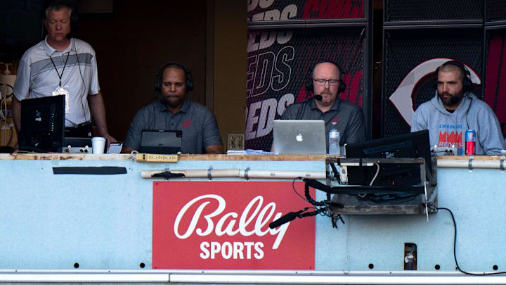 Cincinnati Reds first baseman Joey Votto participates in the live television broadcast of the Cincinnati Reds with Barry Larkin, center, and John Sadak, left, in the third inning of the MLB game between between the Cincinnati Reds and the St. Louis Cardinals at Great American Ball Park in Cincinnati, Wednesday, Aug. 31, 2022.

St Louis Cardinals At Cincinnati Reds