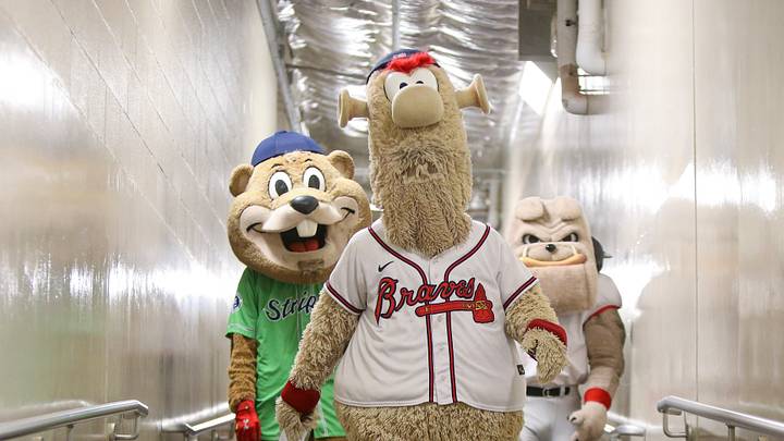 Jul 31, 2022; Atlanta, Georgia, USA; Atlanta Braves mascot Blooper walks towards the field with Gwinnett Stripers mascot Chopper and Georgia Bulldogs mascot Hairy Dawg during a game against the Arizona Diamondbacks at Truist Park. Mandatory Credit: Brett Davis-USA TODAY Sports Jul 31, 2022; Atlanta, Georgia, USA; Atlanta Braves mascot Blooper walks towards the field with Gwinnett Stripers mascot Chopper and Georgia Bulldogs mascot Hairy Dawg during a game against the Arizona Diamondbacks at Truist Park. Mandatory Credit: Brett Davis-USA TODAY Sports