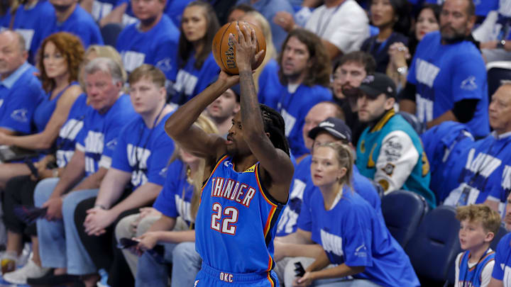 Jun 8, 2025; Oklahoma City, Oklahoma, USA; Oklahoma City Thunder guard Cason Wallace (22) makes a jump shot against the Indiana Pacers during the first quarter of game two of the 2025 NBA Finals at Paycom Center. Mandatory Credit: Alonzo Adams-Imagn Images Jun 8, 2025; Oklahoma City, Oklahoma, USA; Oklahoma City Thunder guard Cason Wallace (22) makes a jump shot against the Indiana Pacers during the first quarter of game two of the 2025 NBA Finals at Paycom Center. Mandatory Credit: Alonzo Adams-Imagn Images