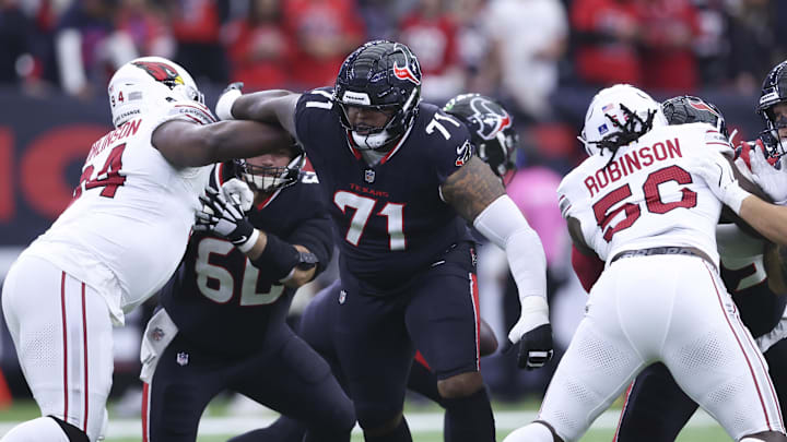 Dec 14, 2025; Houston, Texas, USA; Houston Texans offensive tackle Tytus Howard (71) in action during the first quarter against the Arizona Cardinals at NRG Stadium. Mandatory Credit: Troy Taormina-Imagn Images