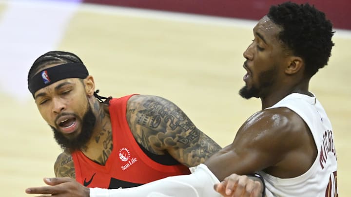 Cleveland Cavaliers guard Donovan Mitchell defends Toronto Raptors forward Brandon Ingram. Cleveland Cavaliers guard Donovan Mitchell defends Toronto Raptors forward Brandon Ingram.