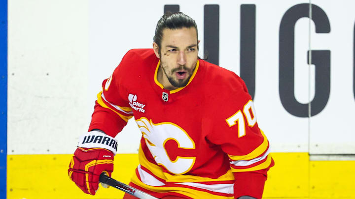 Jan 5, 2026; Calgary, Alberta, CAN; Calgary Flames left wing Ryan Lomberg (70) skates during the warmup period against the Seattle Kraken at Scotiabank Saddledome. Mandatory Credit: Sergei Belski-Imagn Images