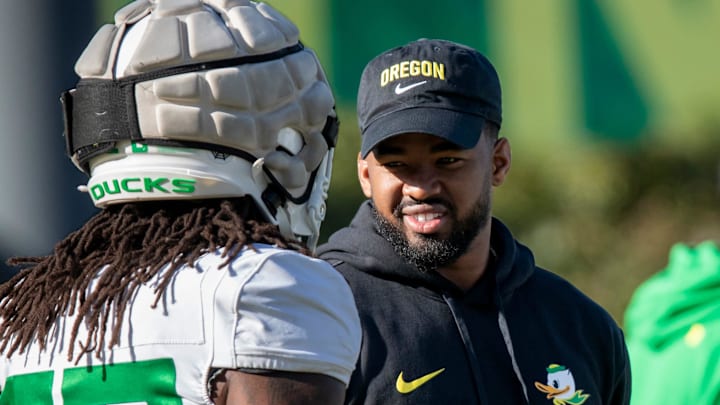 New Oregon running backs coach Ra’Shaad Samples talks with running back Jordan James during practice with the Oregon Ducks Tuesday, April 9, 2024, at the Hatfield-Dowlin Complex in Eugene, Ore. New Oregon running backs coach Ra’Shaad Samples talks with running back Jordan James during practice with the Oregon Ducks Tuesday, April 9, 2024, at the Hatfield-Dowlin Complex in Eugene, Ore.