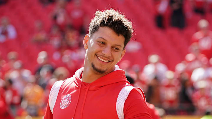 Oct 22, 2023; Kansas City, Missouri, USA; Kansas City Chiefs quarterback Patrick Mahomes (15) laughs during warm ups against the Los Angeles Chargers prior to a game at GEHA Field at Arrowhead Stadium. Mandatory Credit: Denny Medley-Imagn Images