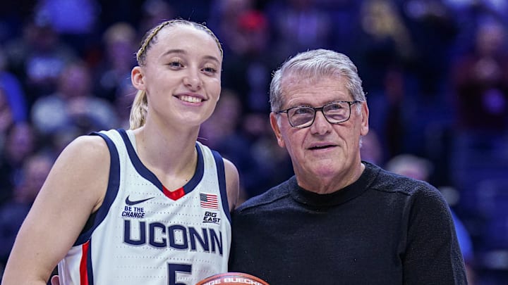 Jan 22, 2025; Storrs, Connecticut, USA; UConn Huskies guard Paige Bueckers (5) is recognized with head coach Geno Auriemma for her 2000 career points before the start of the game against the Villanova Wildcats at Harry A. Gampel Pavilion. Mandatory Credit: David Butler II-Imagn Images Jan 22, 2025; Storrs, Connecticut, USA; UConn Huskies guard Paige Bueckers (5) is recognized with head coach Geno Auriemma for her 2000 career points before the start of the game against the Villanova Wildcats at Harry A. Gampel Pavilion. Mandatory Credit: David Butler II-Imagn Images