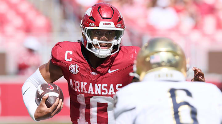 Arkansas Razorbacks quarterback Taylen Green (10) rushes during the fourth quarter against the Notre Dame Fighting Irish at Razorback Stadium. Arkansas Razorbacks quarterback Taylen Green (10) rushes during the fourth quarter against the Notre Dame Fighting Irish at Razorback Stadium.