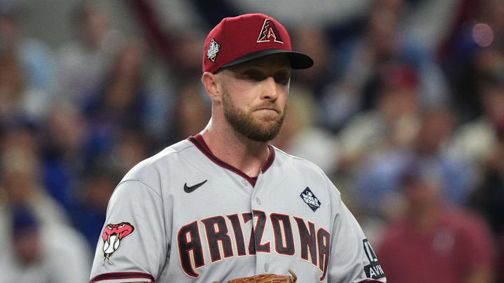 Arizona Diamondbacks starting pitcher Merrill Kelly (29) looks on against the Texas Rangers during the first inning in game two of the 2023 World Series at Globe Life Field on Oct. 28, 2023, Arlington, Texas. Arizona Diamondbacks starting pitcher Merrill Kelly (29) looks on against the Texas Rangers during the first inning in game two of the 2023 World Series at Globe Life Field on Oct. 28, 2023, Arlington, Texas.