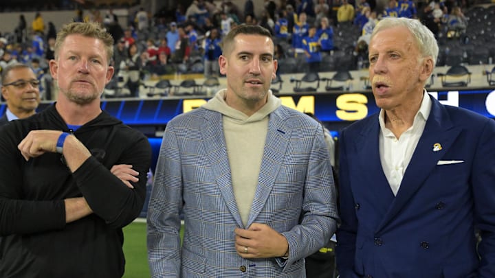 Nov 23, 2025; Inglewood, California, USA; Los Angeles Rams general manager Les Snead, CEO Tony Pastoors and Owner/Chairman Stan Kroenke on the field following the game against the Tampa Bay Buccaneers at SoFi Stadium. Mandatory Credit: Jayne Kamin-Oncea-Imagn Images Nov 23, 2025; Inglewood, California, USA; Los Angeles Rams general manager Les Snead, CEO Tony Pastoors and Owner/Chairman Stan Kroenke on the field following the game against the Tampa Bay Buccaneers at SoFi Stadium. Mandatory Credit: Jayne Kamin-Oncea-Imagn Images