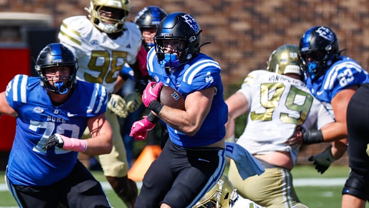 Oct 18, 2025; Durham, North Carolina, USA; Duke Blue Devils running back Anderson Castle (4) runs with the ball during the first half of the game against Georgia Tech Yellow Jackets at Wallace Wade Stadium. Mandatory Credit: Jaylynn Nash-Imagn Images Oct 18, 2025; Durham, North Carolina, USA; Duke Blue Devils running back Anderson Castle (4) runs with the ball during the first half of the game against Georgia Tech Yellow Jackets at Wallace Wade Stadium. Mandatory Credit: Jaylynn Nash-Imagn Images