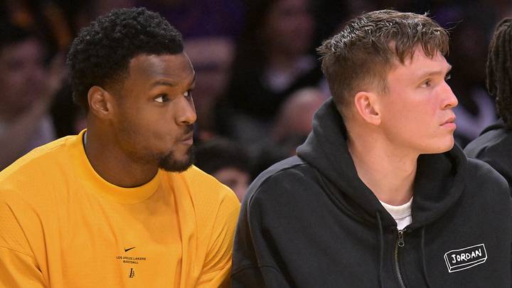 Oct 8, 2026; Los Angeles, California, USA;  Los Angeles Lakers guard Bronny James (9) and forward Dalton Knecht (4) look on from the bench during the first half against the Sacramento Kings at Crypto.com Arena. Mandatory Credit: Jayne Kamin-Oncea-Imagn Images