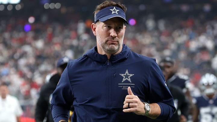 Dallas Cowboys head coach Brian Schottenheimer runs off the field at halftime of a game against the Houston Texans. Dallas Cowboys head coach Brian Schottenheimer runs off the field at halftime of a game against the Houston Texans.