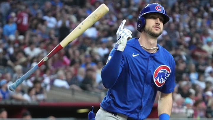 Mar 29, 2025; Phoenix, Arizona, USA; Chicago Cubs outfielder Kyle Tucker (30) hits a two-run home run against the Arizona Diamondbacks in the fifth inning at Chase Field