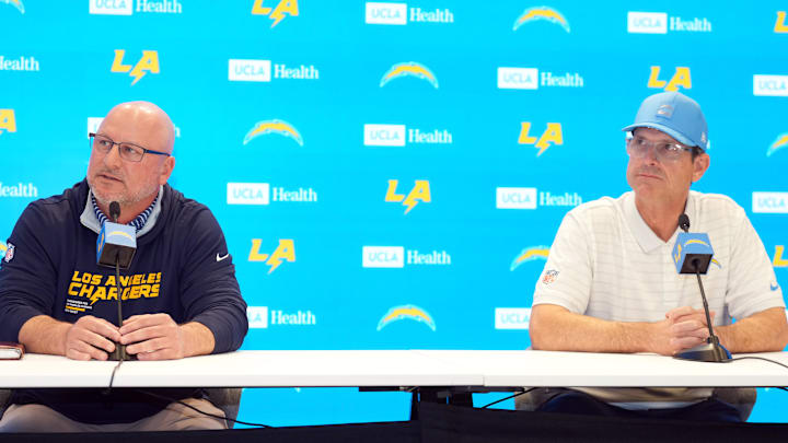 Joe Hortiz and Jim Harbaugh answer questions at the Bolt.