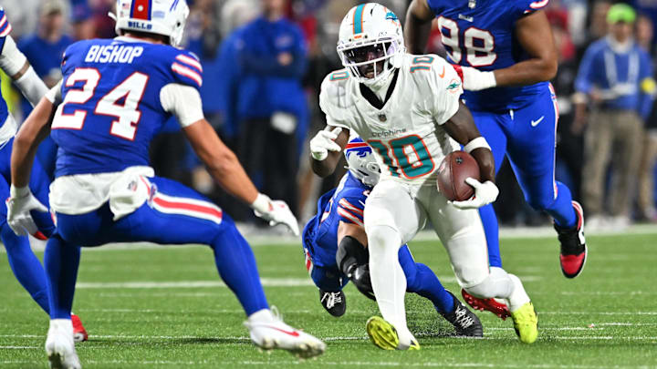 Sep 18, 2025; Orchard Park, New York, USA; Miami Dolphins wide receiver Tyreek Hill (10) runs against Buffalo Bills linebacker Terrel Bernard (8) and safety Cole Bishop (24) in the second quarter at Highmark Stadium. Mandatory Credit: Mark Konezny-Imagn Images Sep 18, 2025; Orchard Park, New York, USA; Miami Dolphins wide receiver Tyreek Hill (10) runs against Buffalo Bills linebacker Terrel Bernard (8) and safety Cole Bishop (24) in the second quarter at Highmark Stadium. Mandatory Credit: Mark Konezny-Imagn Images