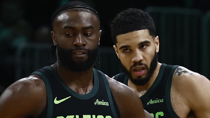 Feb 28, 2025; Boston, Massachusetts, USA; Boston Celtics guard Jaylen Brown (7) and forward Jayson Tatum (0) stand on the court during a timeout during the second half of their loss to the Cleveland Cavaliers at TD Garden. Mandatory Credit: Winslow Townson-Imagn Images