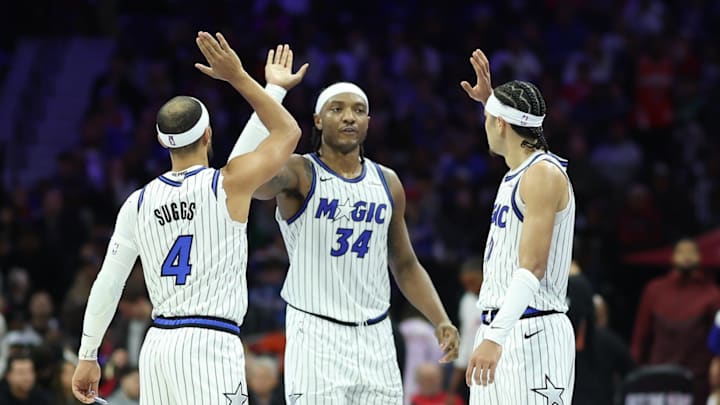 Nov 25, 2025; Philadelphia, Pennsylvania, USA; Orlando Magic guard Anthony Black (0) and center Wendell Carter Jr. (34) and guard Jalen Suggs (4) high-five after a play against the Philadelphia 76ers during the second quarter at Xfinity Mobile Arena. Mandatory Credit: Bill Streicher-Imagn Images