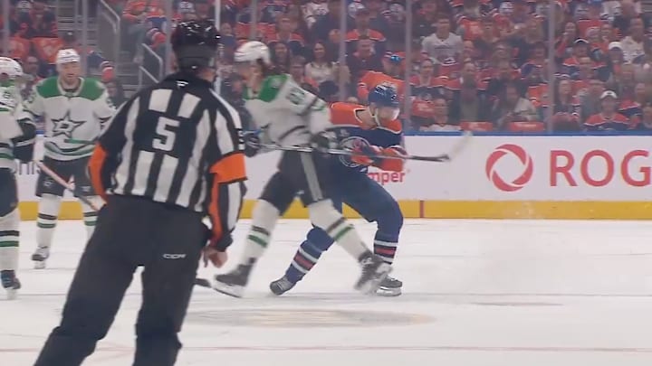 Edmonton Oilers forward Zach Hyman is hit by Dallas Stars winger Mason Marchment and suffers an apparent injury. 