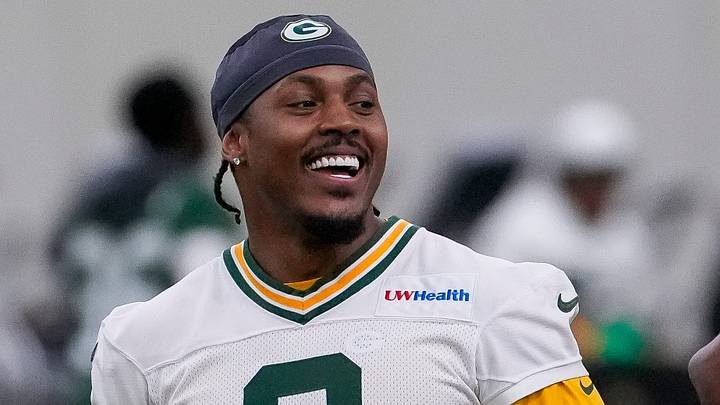 Green Bay Packers running back Josh Jacobs (8) laughs during practice in June. Green Bay Packers running back Josh Jacobs (8) laughs during practice in June.