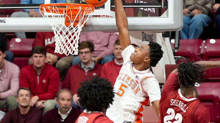 Dec 3, 2025; Tuscaloosa, AL, USA; Clemson guard Zac Foster (5) dunks the ball against Alabama at Coleman Coliseum. Alabama defeated Clemson 90-84. Mandatory Credit: Gary Cosby Jr.-Tuscaloosa News
