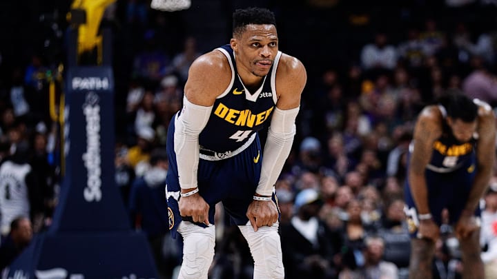 Apr 2, 2025; Denver, Colorado, USA; Denver Nuggets guard Russell Westbrook (4) and center DeAndre Jordan (6) in the fourth quarter against the San Antonio Spurs at Ball Arena. Mandatory Credit: Isaiah J. Downing-Imagn Images