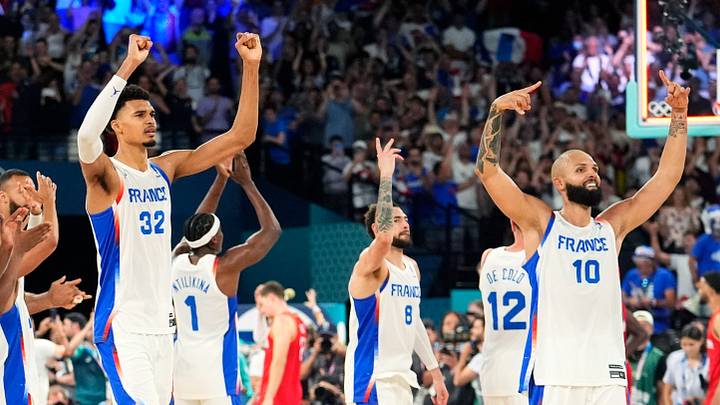 Aug 8, 2024; Paris, France; France power forward Victor Wembanyama (32) and shooting guard Evan Fournier (10) celebrate after the game against Germany in a men's basketball semifinal game during the Paris 2024 Olympic Summer Games at Accor Arena. Aug 8, 2024; Paris, France; France power forward Victor Wembanyama (32) and shooting guard Evan Fournier (10) celebrate after the game against Germany in a men's basketball semifinal game during the Paris 2024 Olympic Summer Games at Accor Arena.