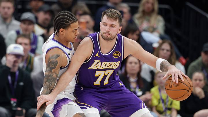 Dec 18, 2025; Salt Lake City, Utah, USA; Los Angeles Lakers forward/guard Luka Doncic (77) tries to keep Utah Jazz guard Keyonte George (3) away from the ball during the second half at Delta Center. Mandatory Credit: Chris Nicoll-Imagn Images Dec 18, 2025; Salt Lake City, Utah, USA; Los Angeles Lakers forward/guard Luka Doncic (77) tries to keep Utah Jazz guard Keyonte George (3) away from the ball during the second half at Delta Center. Mandatory Credit: Chris Nicoll-Imagn Images