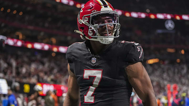 Dec 29, 2025; Atlanta, Georgia, USA; Atlanta Falcons running back Bijan Robinson (7) reacts after catching a touchdown pass against the Los Angeles Rams during the first quarter at Mercedes-Benz Stadium. Mandatory Credit: Dale Zanine-Imagn Images