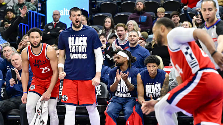 Feb 13, 2025; Salt Lake City, Utah, USA; LA Clippers bench reacts after a basket against the Utah Jazz during overtime at the Delta Center. Mandatory Credit: Christopher Creveling-Imagn Images