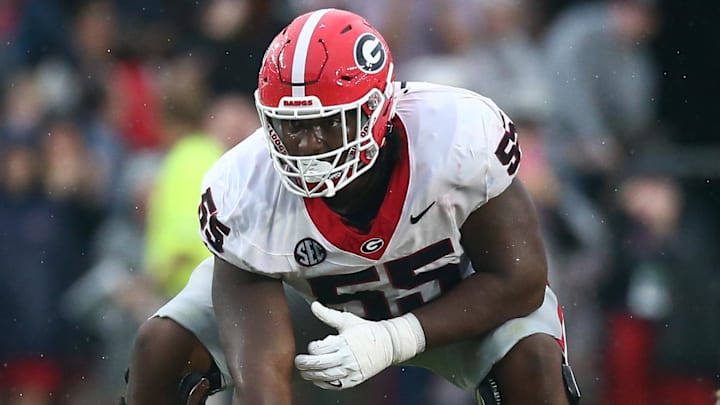 Nov 9, 2024; Oxford, Mississippi, USA; Georgia Bulldogs offensive lineman Jared Wilson (55) prepares to snap the ball during the first half against the Mississippi Rebels at Vaught-Hemingway Stadium. Mandatory Credit: Petre Thomas-Imagn Images