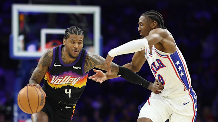 Jan 20, 2026; Philadelphia, Pennsylvania, USA; Phoenix Suns guard Jalen Green (4) drives against Philadelphia 76ers guard Tyrese Maxey (0) during the first quarter at Xfinity Mobile Arena. Mandatory Credit: Bill Streicher-Imagn Images