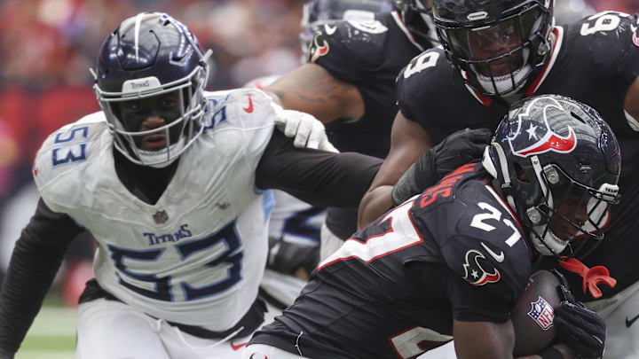 Houston Texans running back Woody Marks runs with the ball during the fourth quarter against the Tennessee Titans.